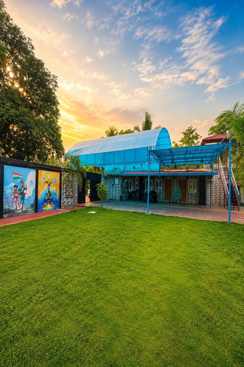 Lawn and cottages at Re Leaf Resort at sunset