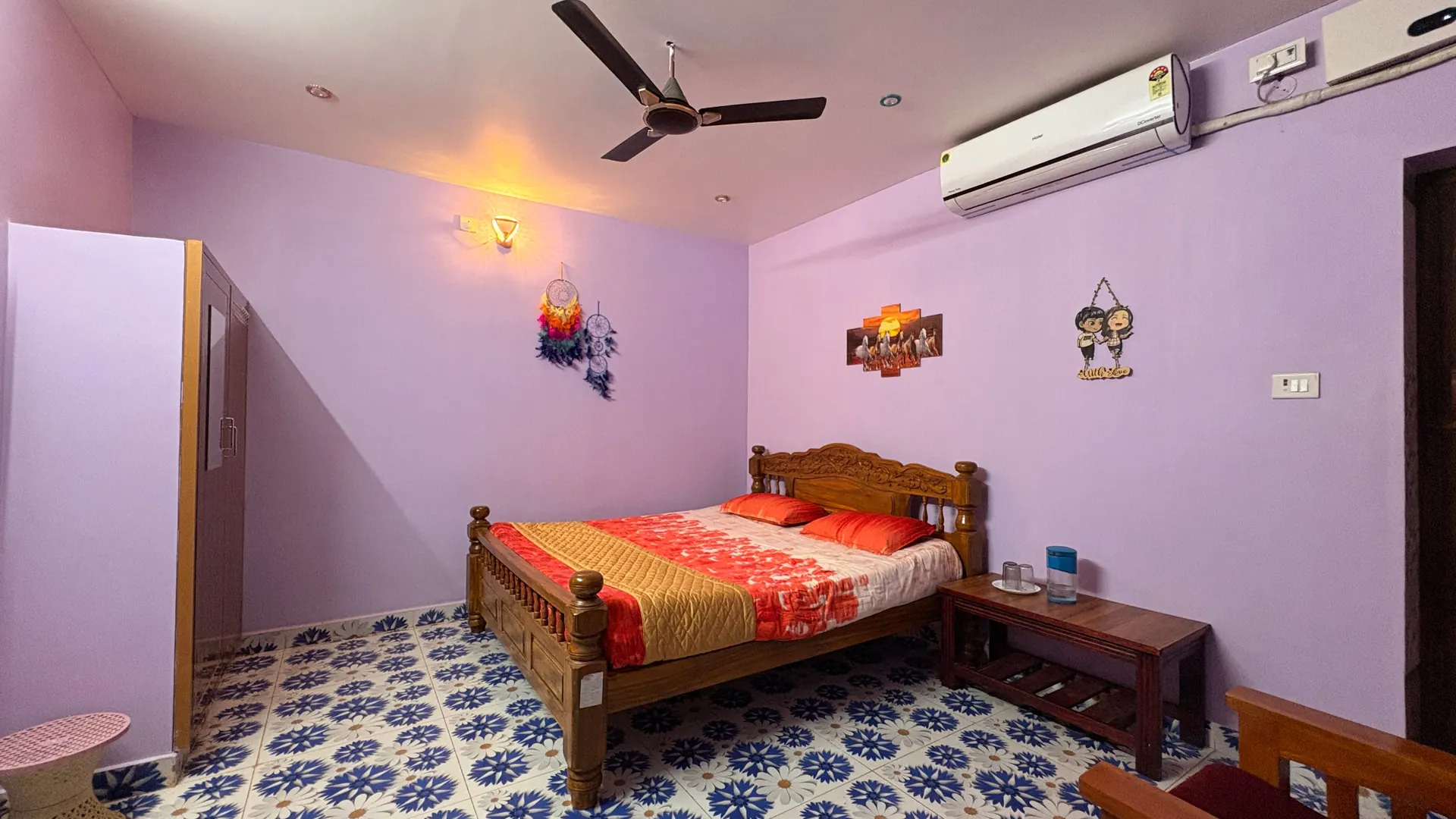 AC Cottage bedroom interior with air conditioning unit and comfortable bed